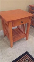Small wooden end table with drawer