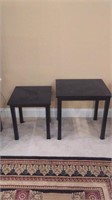 Two small black end tables