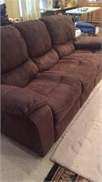 Two electric brown leather reclining couches