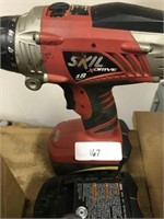 SKIL XDRIVE CORDLESS DRILL WITH TWO BATTERIES