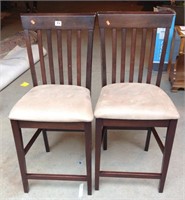 Two bistro style upholstered wood chairs