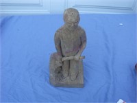 Carved Man Holding an Axe