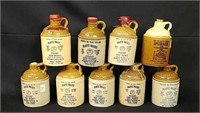 Nine Miniature Mccormick Whiskey Jugs