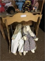 TWO BUNNY DOLLS WITH SWING