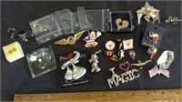 ASSORTMENT OF BROOCHES, LAPEL PINS, CHARMS,