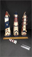 3 DECORATIVE HANGING LIGHTHOUSES AND A
