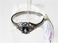 $600. 10kt. Tanzanite (0.52ct) Ring (Size 6.5)