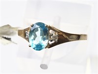 $500. 10kt. Blue Topaz (0.5ct) Ring (Size 6.5)