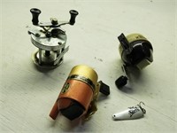 Three Fishing Reels and Lure