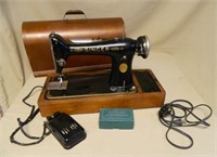 1931 Singer Portable Sewing Machine in Oak Case.