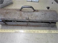 Early metal tool box with a few tools