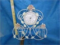 Beautiful metal wall clock with candle holders by