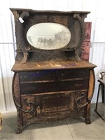 Old dresser w/ oval mirror--missing trim