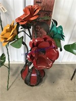 Flowers in vase yard art