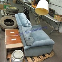 Blue stuffed chair, floor lamp,