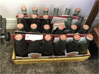LOT OF 23 CHRISTMAS COKE BOTTLES WITH CASES