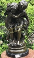 SIGNED BRONZE SCULPTURE OF TWO CHILDREN EMBRACING