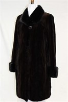 Brown sheared Mink with mink trim cuffs and collar