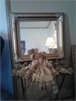 Gold tone mirror and angels