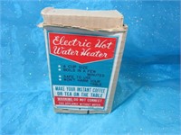 Japan Electric Hot Water Heater in original box;