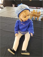 Unmarked Baby Doll with Clothing Assortment