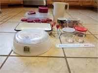 lot of misc.  tupperware w/ lids, cups, measuring
