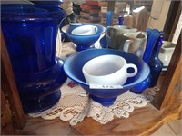 Contents bottom shelf cobalt blue glassware