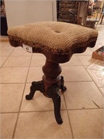 Antique piano stool with cast iron legs