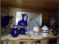 Contents top-shelf curio cabinet cobalt blue