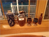 Ali's pottery with antique bottle