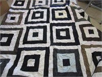 Homemade quilt 64 x 86; machined & hand stitched;