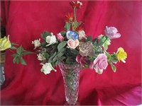 Elegant vase with glass roses; some of the roses