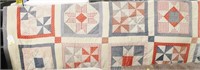 Hand made quilt, some squares are pinwheel