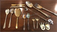 Assorted silverplate flatware with candle snuffer