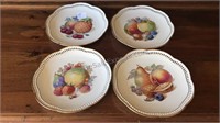 Set of four hand painted decorative plates made
