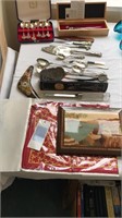 Collection of spoons and letter openers and