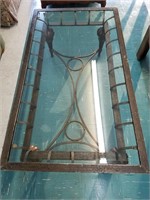 Glass top iron coffee table 42" x 28"