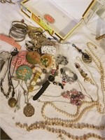 Costume jewelry, several watches,