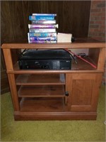 ENTERTAINMENT CENTER WITH ZENITH VCR AND BOX TAPES