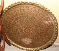 LARGE BRASS TRAY W/ RED CHASING ON TOP