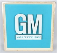 GM MARK OF EXCELLENCE SIGN