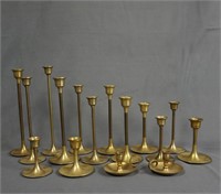 Two 8 Piece Brass Graduated Candle Stick Sets