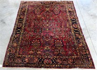 8'11" x 11'5" Oriental Sarouk carpet, damage on