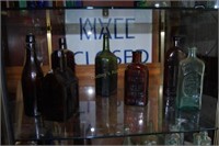 7x$ 19th century tonic & whiskey bottles,