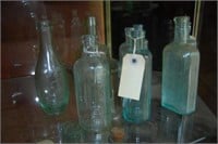 11 assorted tonic bottles incl. Moses Atwood,