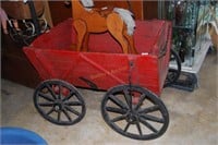 European wooden spoke wheeled goat cart in red