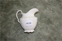 White Milk Pitcher with small chip