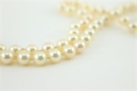 34" Long Pearl Necklace. 14k Gold.
