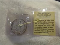 Old Mexican Silver Dollar in Sleeve