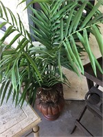 Artificial palm fronds, ceramic vase